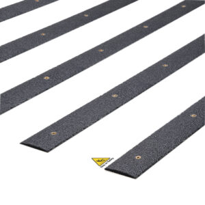 Close-up of black QuartzGrip Decking Strips showing the anti-slip finish