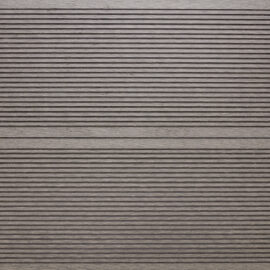 Close-up of RecDeck light grey composite decking boards showing the slip-resistant grooved texture