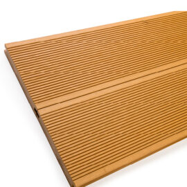 Close up of RecoDeck solid WPC decking boards in grooved teak finish