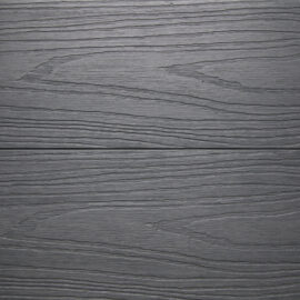 Close up of RecoDeck Slate Grey composite Decking boards showing the slip-resistant woodgrain finish