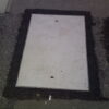 A GRP solid top manhole cover