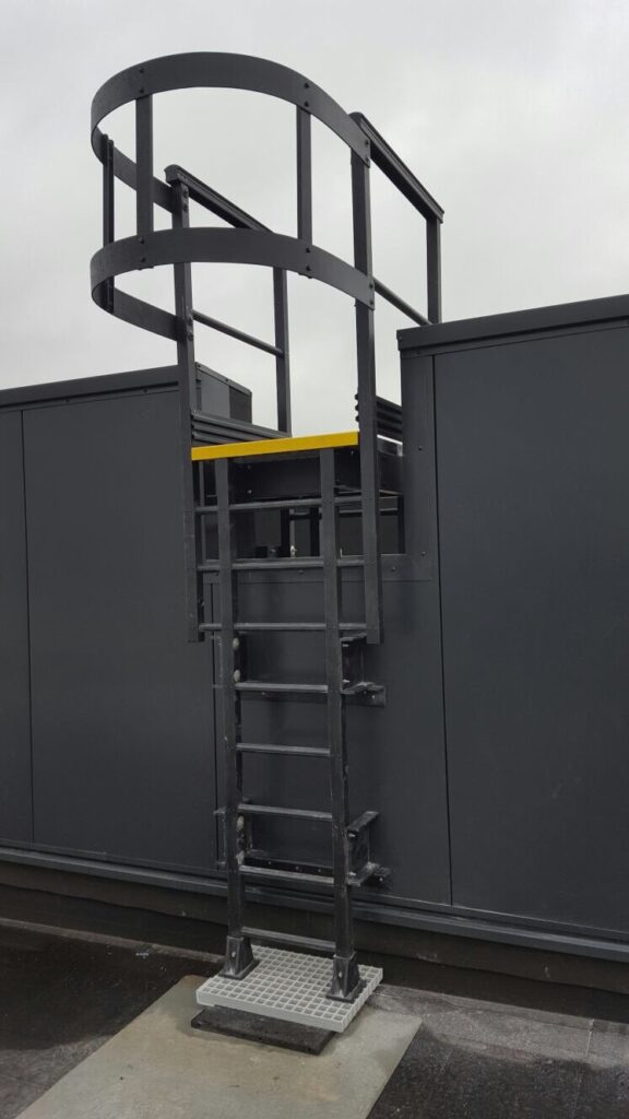 GRP Fixed Access Ladder on a rooftop with safety cage 