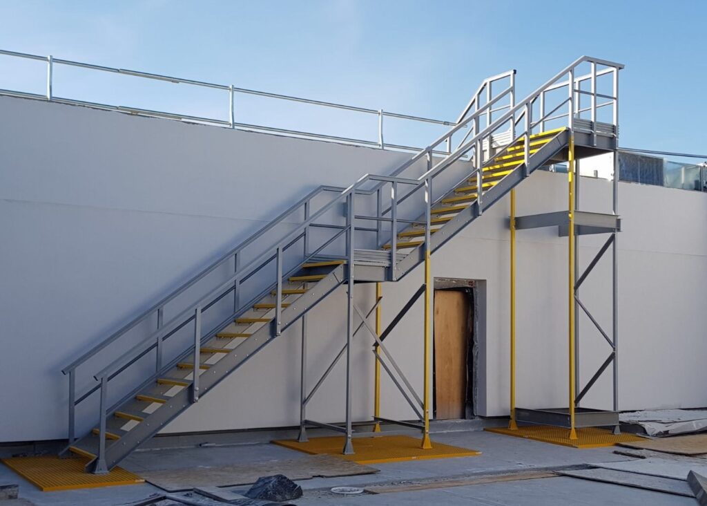 Multi-storey GRP staircase to provide safe roof access at a school.