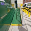Access ramp leading to a platform in front of a kiosk for Lintott in Scotland