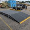 Photos shows a GRP access ramp pre-constructed at the Step on Safety workshop in Brantham,Suffolk