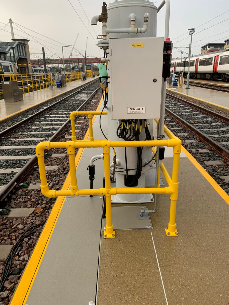 SafeClamp GRP handrailing installed around cables and pipework at Cambridge Rail depot