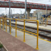 An extended stretch of SafeClamp GRP handrail running alongside railway lines at Cambridge depot