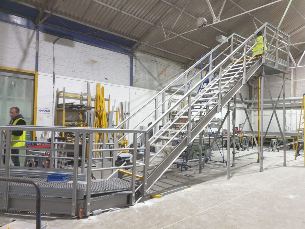 A GRP embankment staircase being constructed at the Step on Safety workshop in Suffolk