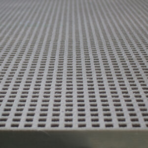 A close-up of a panel of QuartzGrip GRP Mini Mesh Grating in grey showing the slip-resistant, gritted finish