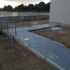 Photo on a construction site showing GRP SafeSlab panels installed to cover a trench