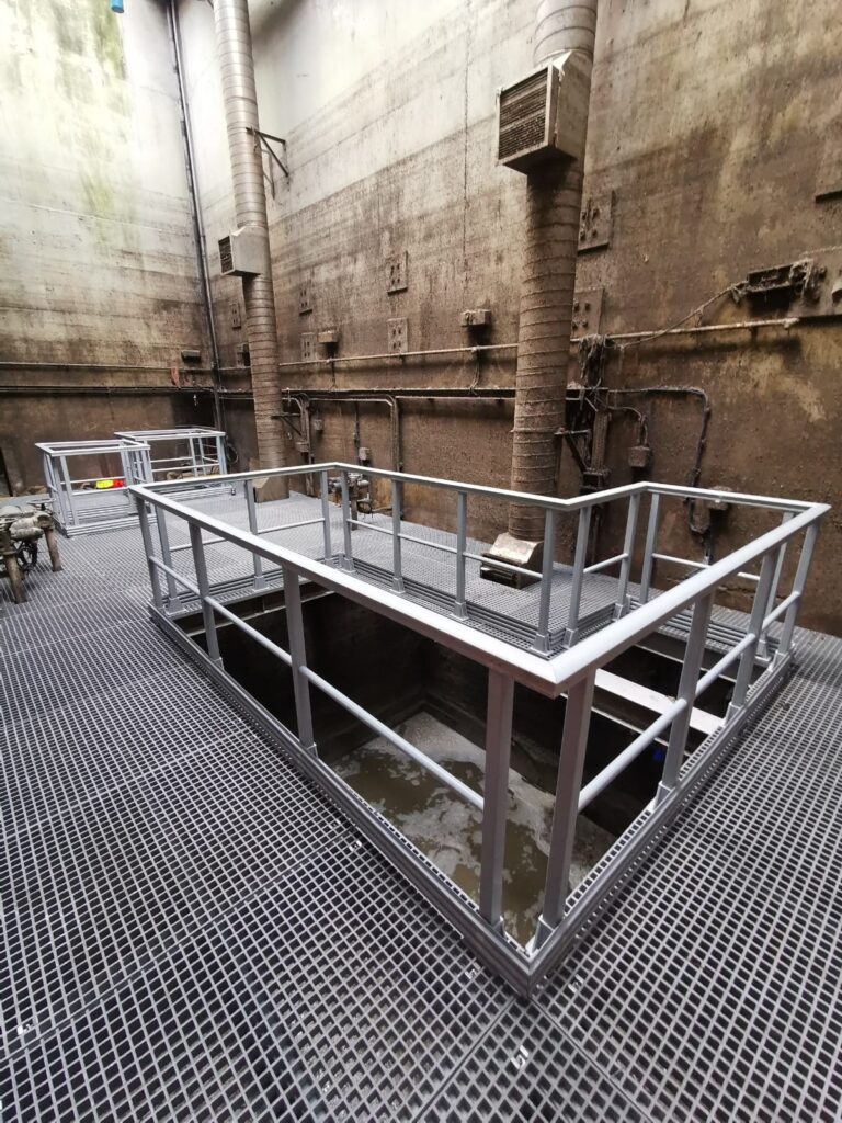 A suspended maintenance platform built using GRP profiles, open mesh and handrail and installed 11m down in a foul water chamber at Anglian Water's London Road Pumping Station in West Thurrock.