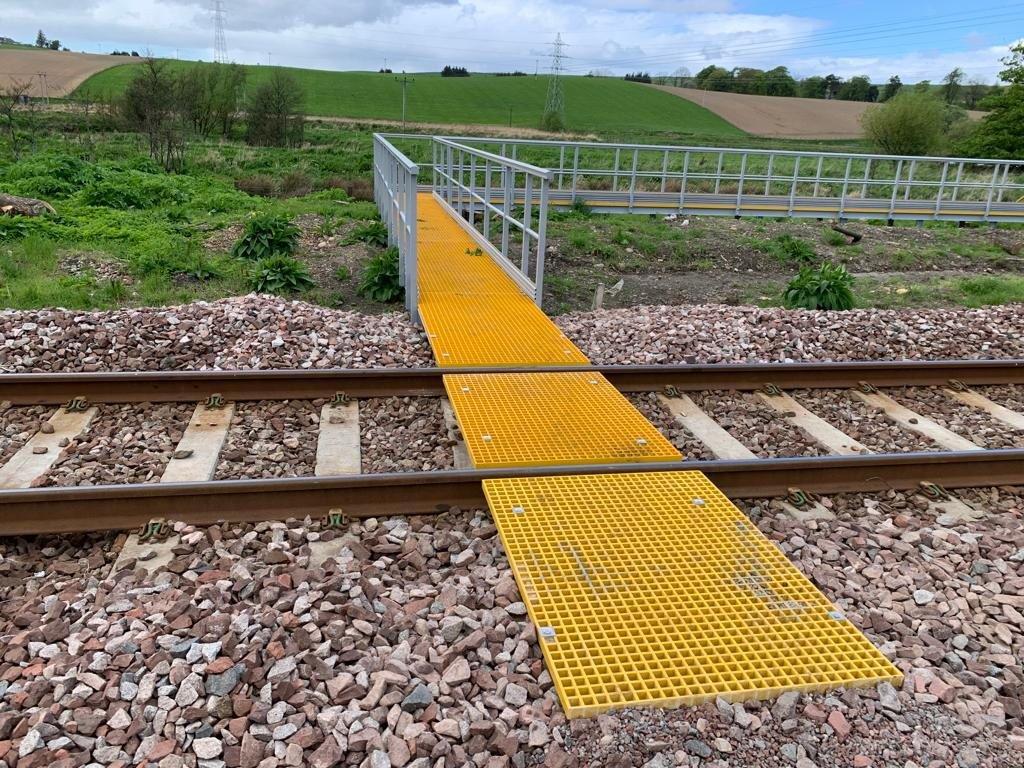 The new GRP walkway starts by crossing the railway line at Keith Junction.