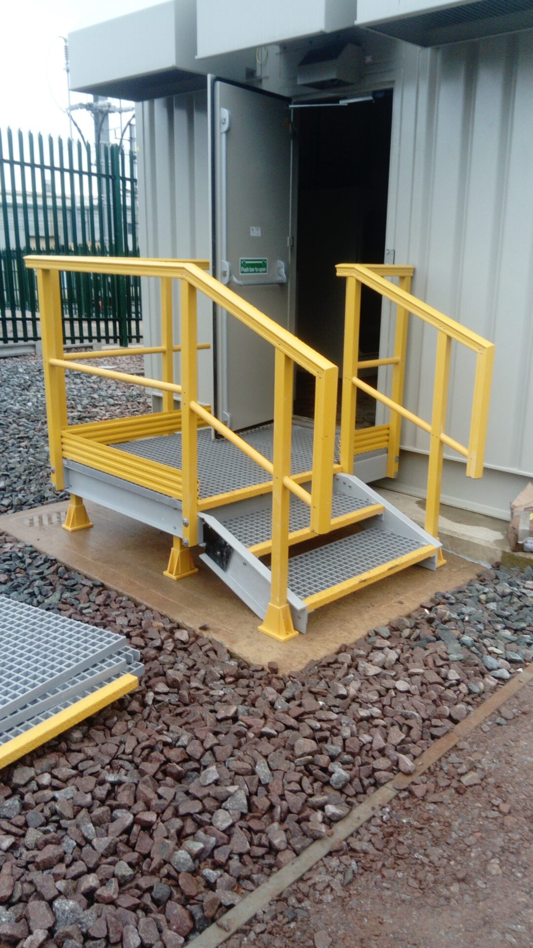 GRP Access Stairs with hi vis yellow handrail