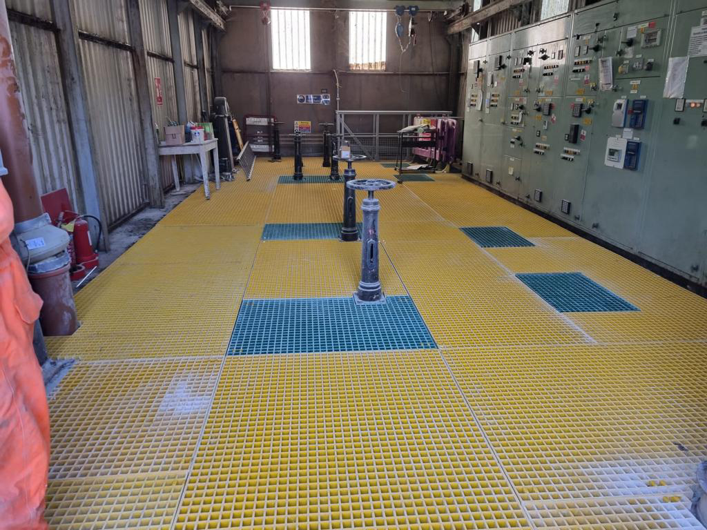 The new GRP floor at Belton Gardens with green hatches above the pumps